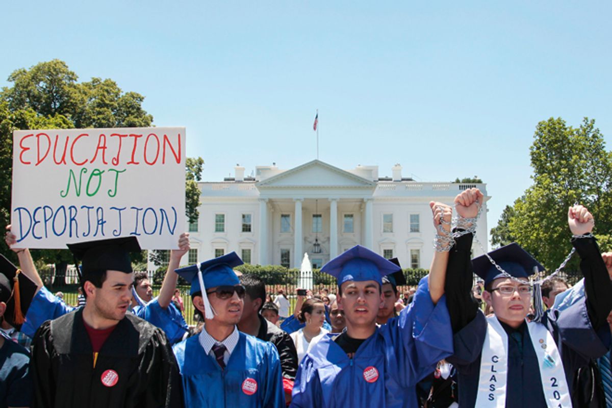 Supporters of the DREAM Act take part in a demonstration in front of the White House.       (AP/Pablo Martinez Monsivais)