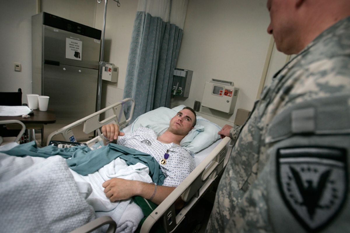A soldier is prepared for an operation at Landstuhl Regional Medical Center.       (Reuters/Kai Pfaffenbach)