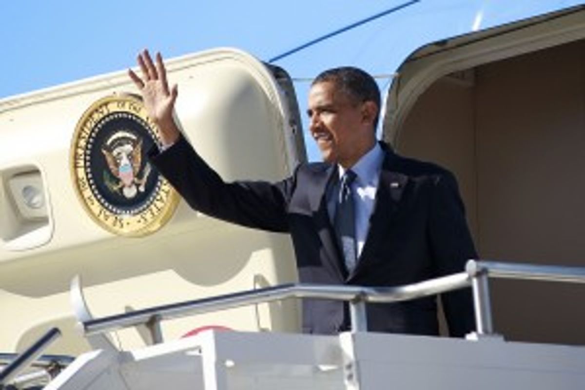  President Barack Obama waves upon his arrival at Peterson Air Force Base, Colo., Wednesday, May 23, 2012.      (AP Photo/Pablo Martinez Monsivais)