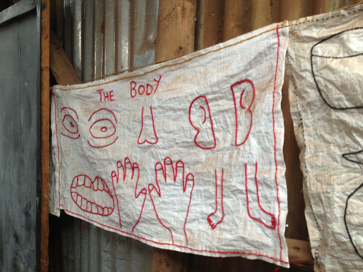  A hand-embroidered poster in a Kibera primary school.    (Irin Carmon)
