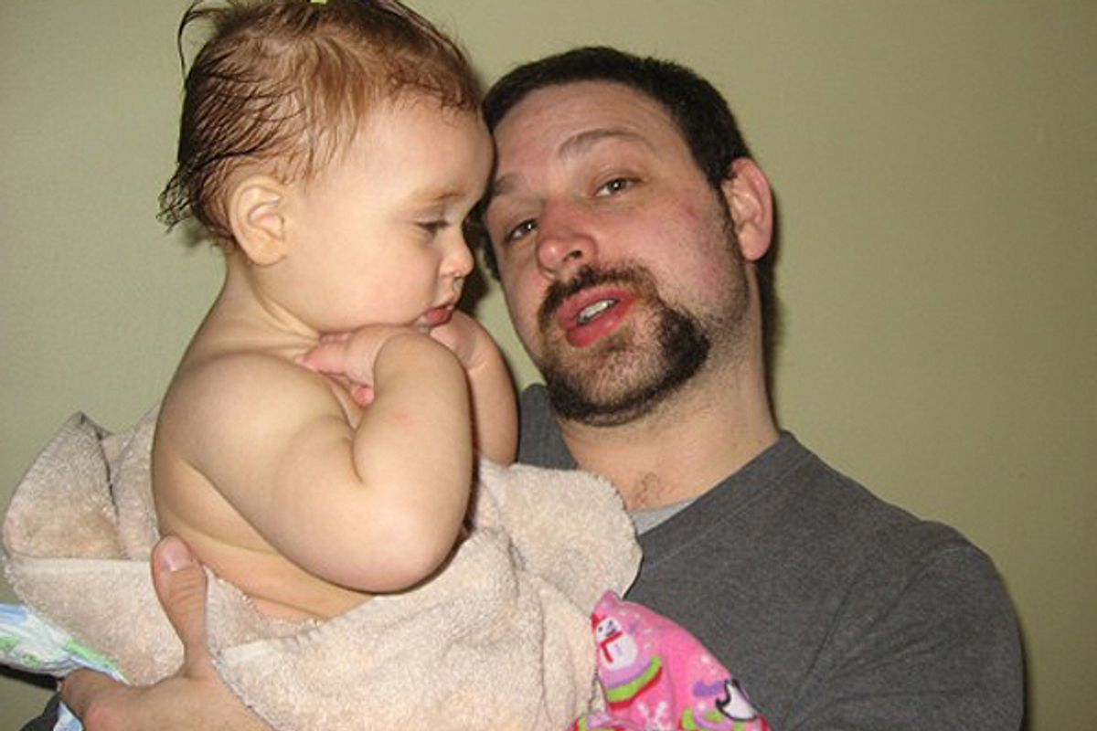 A photo of the author with his daughter.
