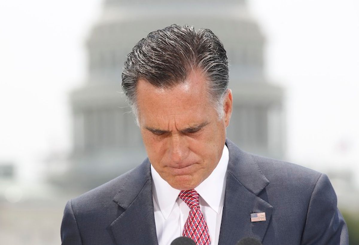 With the Capitol in the background, Republican presidential candidate, former Massachusetts Gov. Mitt Romney pauses while speaking about the Supreme Court's health care ruling, Thursday, June 28, 2012, in Washington.     (AP/Charles Dharapak)