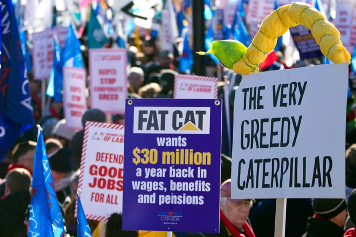 Thousands of unionists from across Ontario and the United States gather in Victoria Park in London, Ontario, on January 21 for a rally in support of Caterpillar workers.    (Reuters/Geoff Robin)