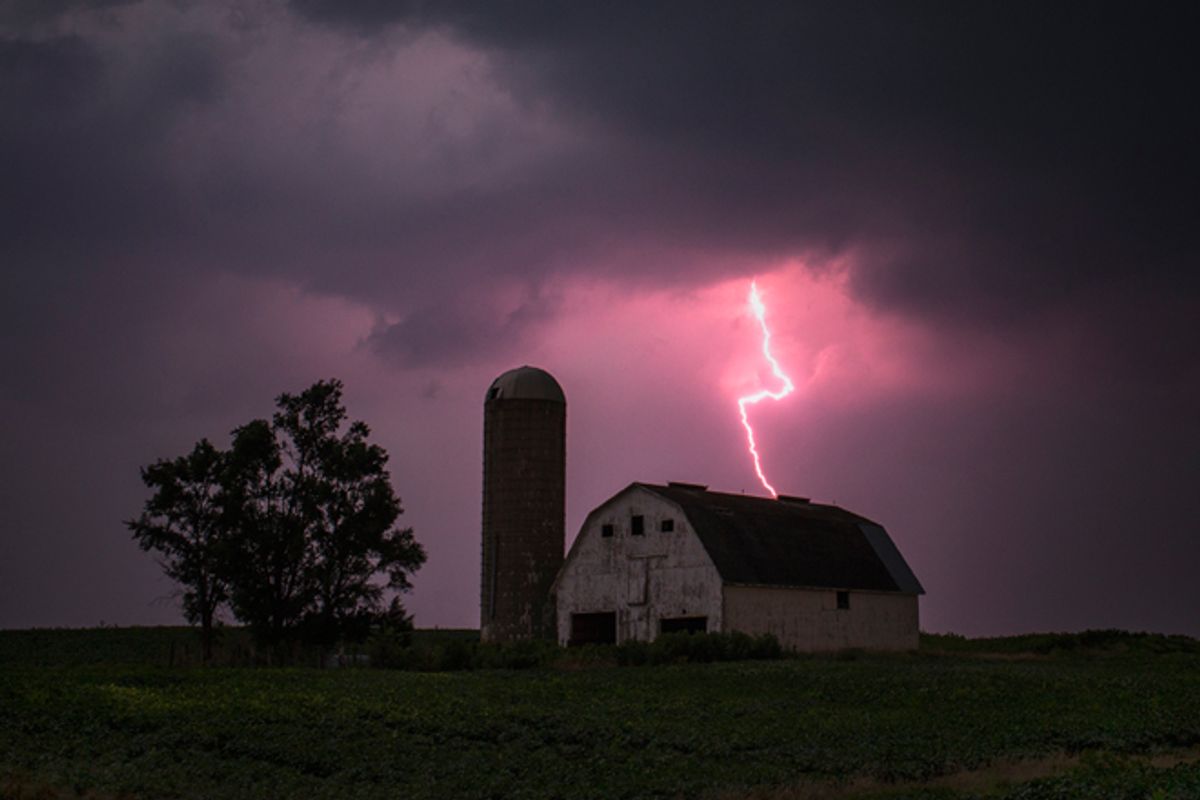 Lighting strikes over a barn surrounded by a soybean crop in Donnellson, Iowa, on July 13.         (Reuters/Adrees Latif)