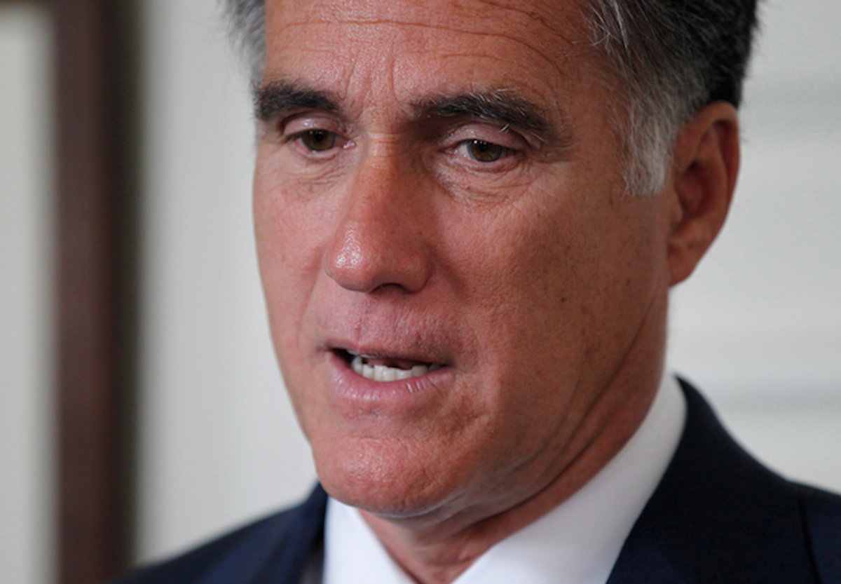 U.S. Republican presidential candidate Mitt Romney speaks to the press during his meeting with Labour Party leader Ed Miliband (not pictured) in London, July 26, 2012.         (REUTERS/Jason Reed)