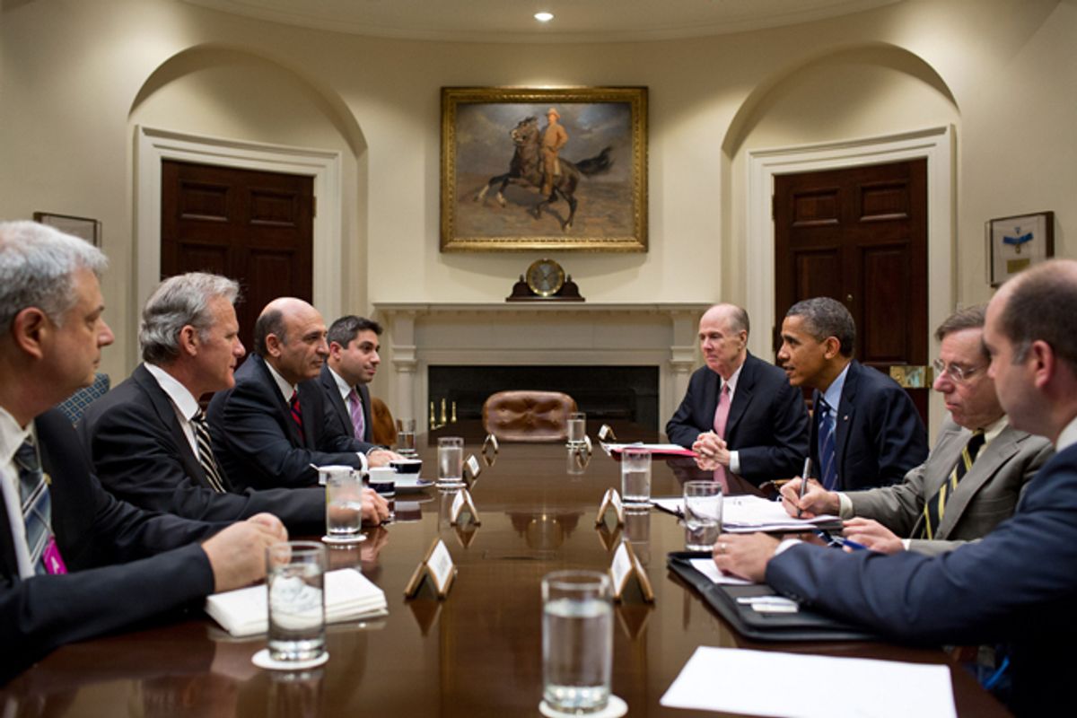 President Obama drops by a meeting in the Roosevelt Room of the White House, June 21, 2012.      (The White House/Pete Souza)