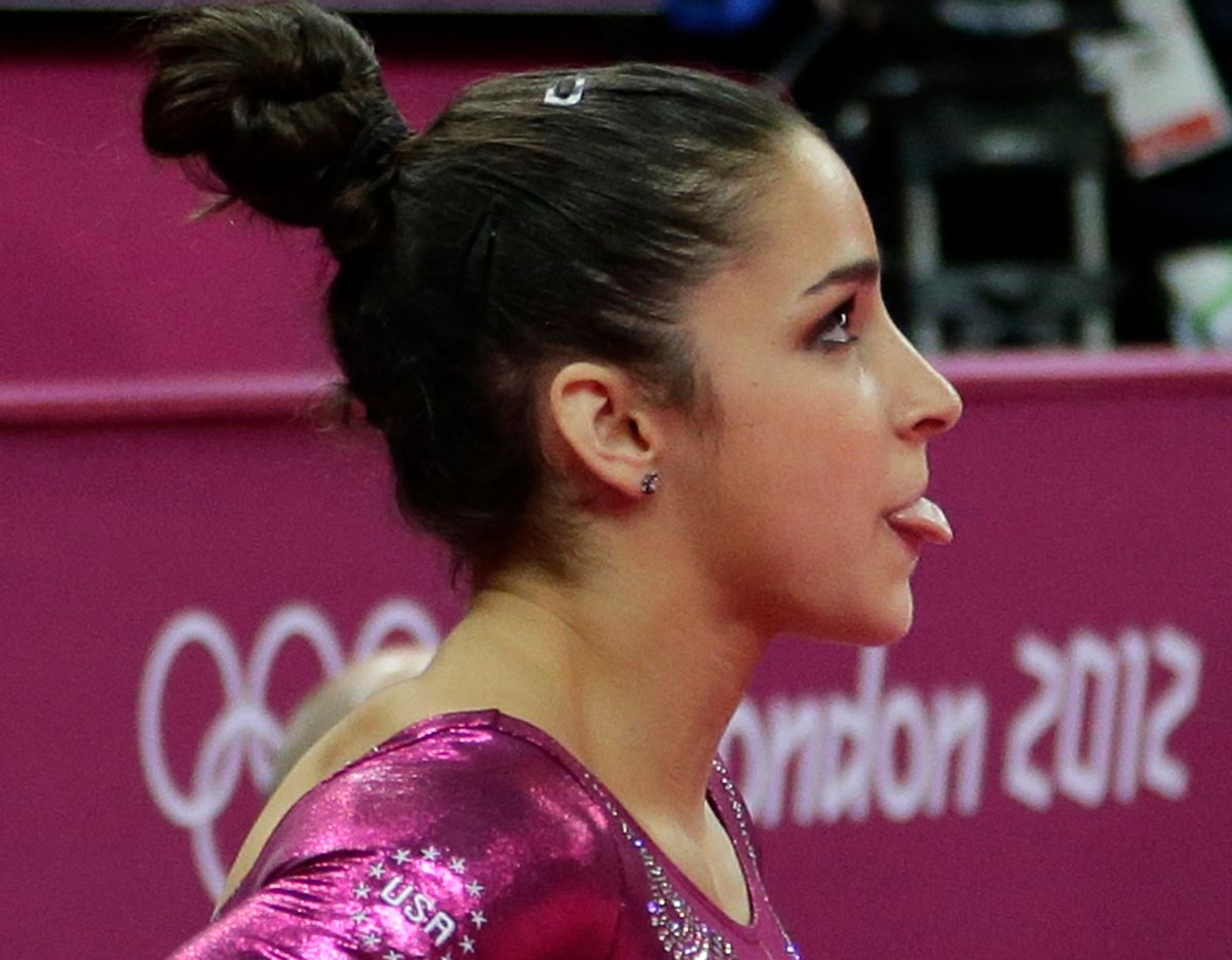 Raisman awaits the scores to be posted (AP/Gregory Bull)