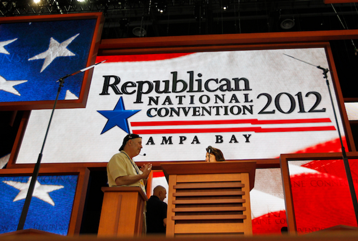  Workers continue the construction of the main stage in advance of the Republican National Convention in Tampa, Fla., Thursday, August 23, 2012.   (AP/J. David Ake)