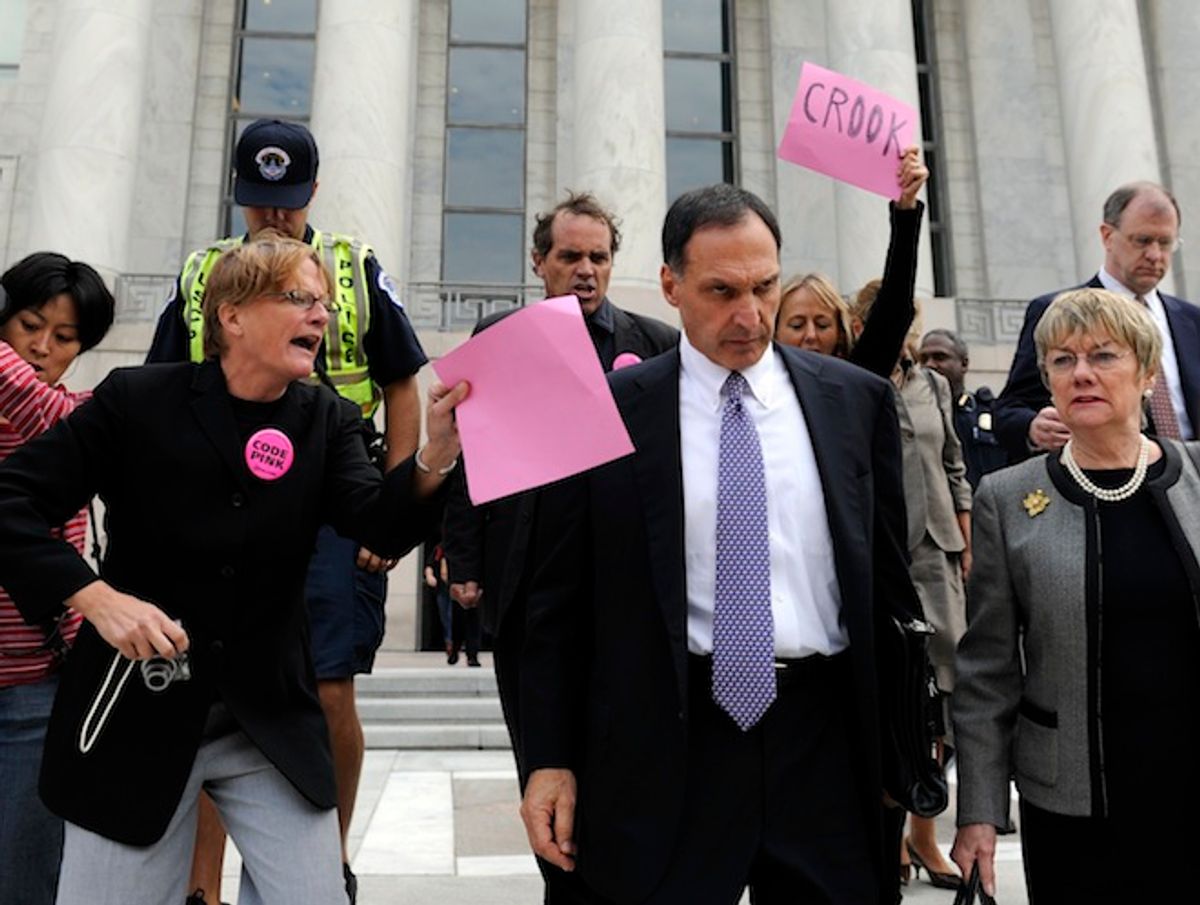 In this Oct. 6, 2008, file photo, Lehman Brothers Holdings Inc. Chief Executive Richard S. Fuld Jr., wearing tie, is heckled by protesters as he leaves Capitol Hill in Washington after testify before the House Oversight and Government Reform Committee on the collapse of Lehman Brothers.      (AP/Susan Walsh)