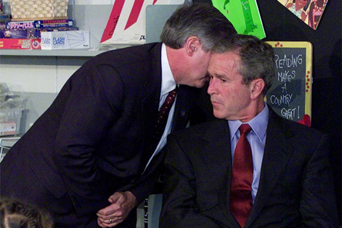 In this Tuesday, Sept. 11, 2001 file photo, Chief of Staff Andy Card whispers into the ear of President George W. Bush to give him word of the plane crashes into the World Trade Center, during a visit to the Emma E. Booker Elementary School in Sarasota, Fla.     (AP/Doug Mills)