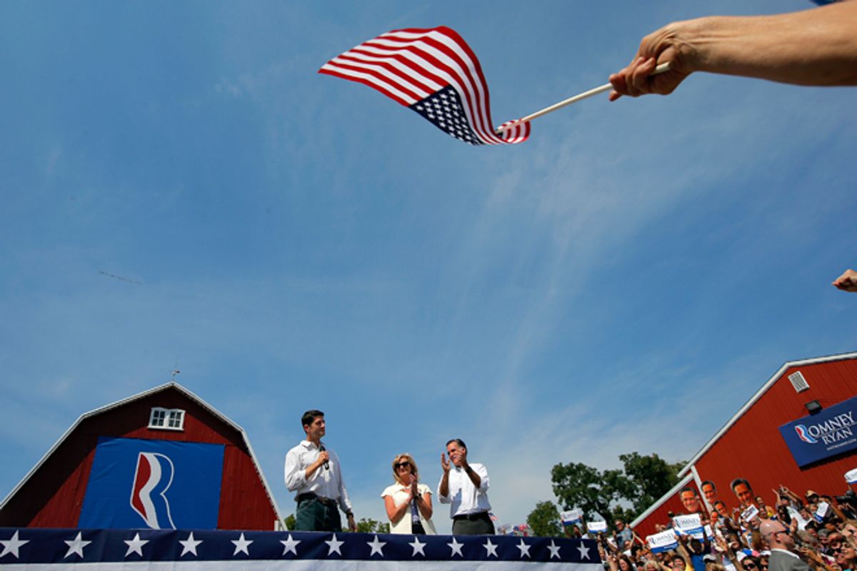 Paul Ryan, Ann Romney and Mitt Romney during a campaign rally in Commerce, Mich., on Aug. 24  (Reuters/Brian Snyder)