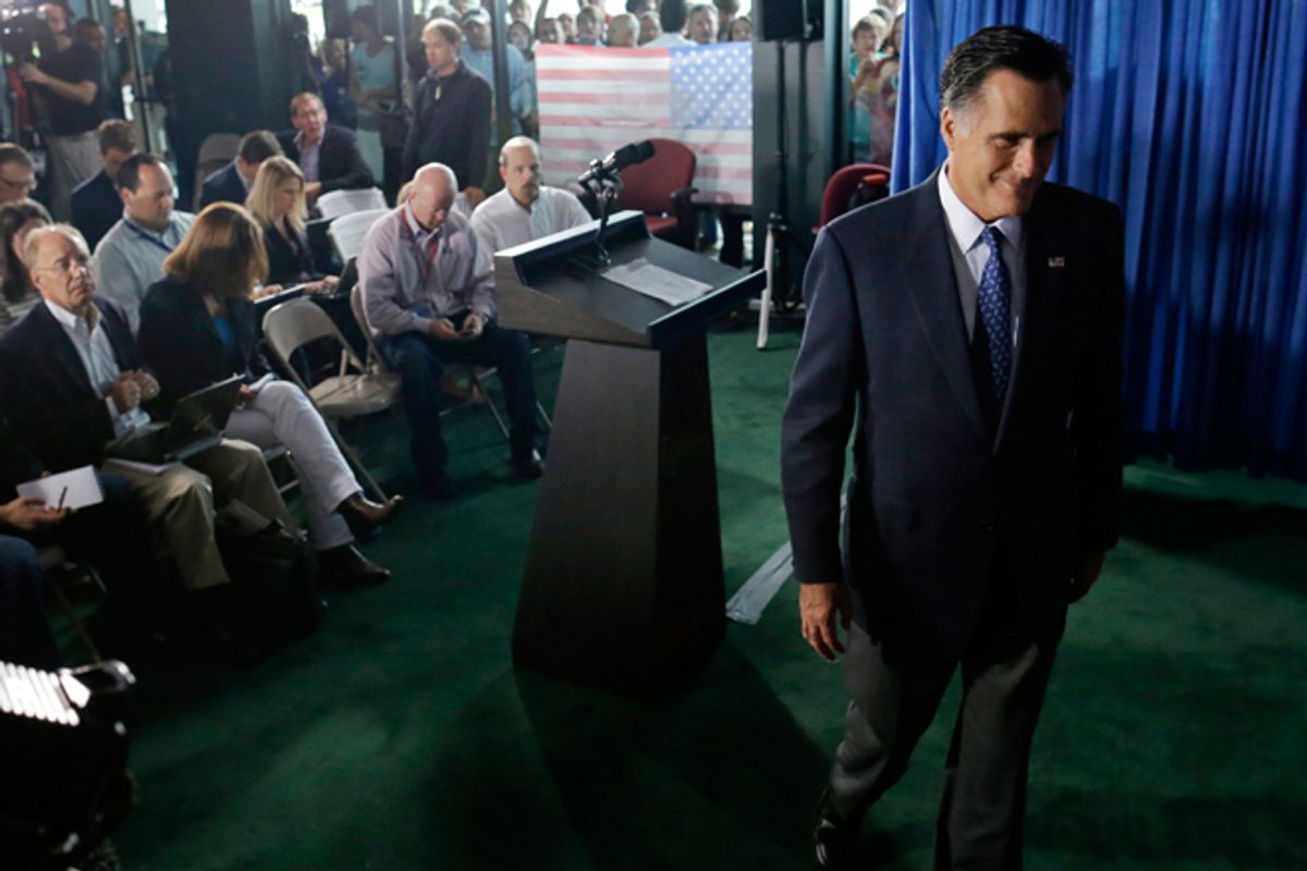 Mitt Romney leaves the podium after making comments on the killing of U.S. embassy officials in Benghazi, Libya, Wednesday, Sept. 12, 2012.           (AP/Charles Dharapak)