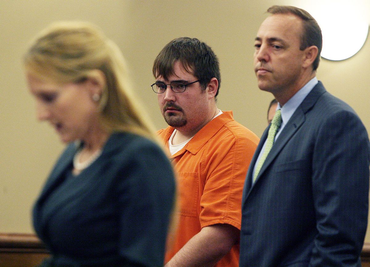 Former Pfc. Christopher Jenderseck, center and his attorney Jarrett Maillet listens as Assistant District Attorney Isabel Pauly, left.   (AP/Lewis M. Levine)