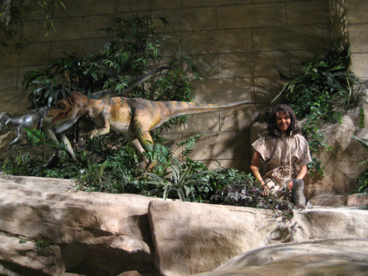 An exhibit in The Creation Museum, Kentucky, showing man co-existing with dinosaur (Wikimedia)   