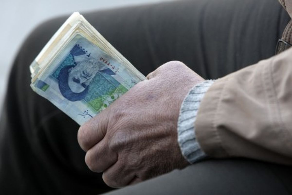 Iranian banknotes with a portrait of late revolutionary founder Ayatollah Khomeini (AP Photo)    
