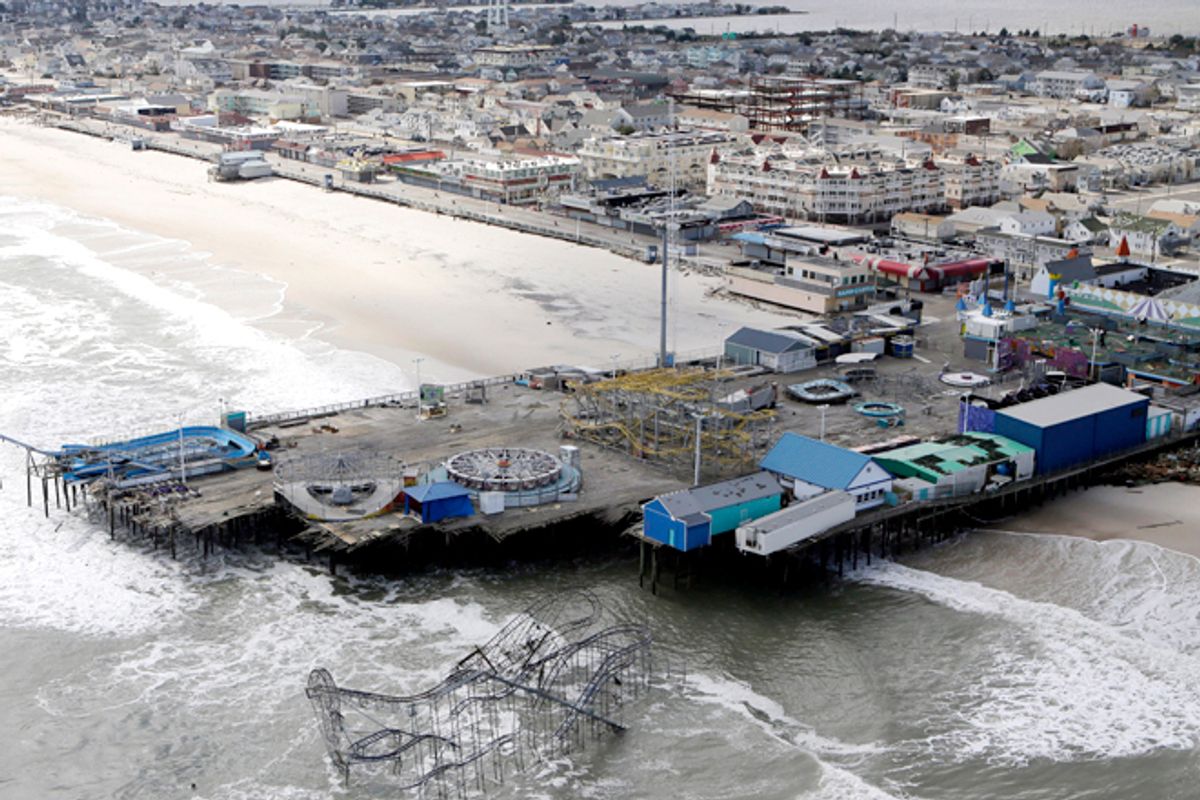 This aerial photo shows the damage to an amusement park left in the wake of superstorm Sandy on Wednesday, Oct. 31, 2012, in Seaside Heights, N.J.       (AP/Mike Groll)