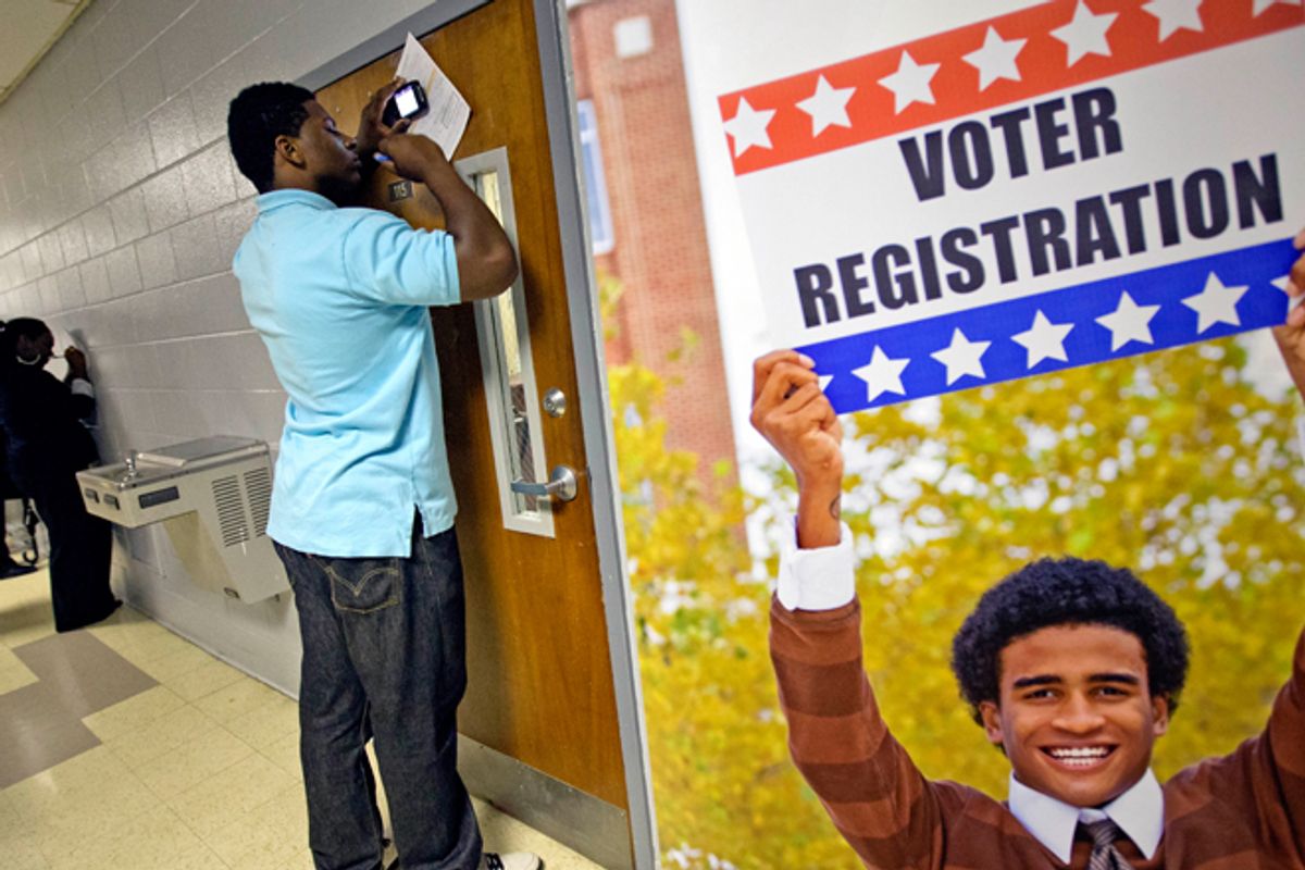 A man fills out a voter registration form in Atlanta on Sept. 12.    (AP/David Goldman)
