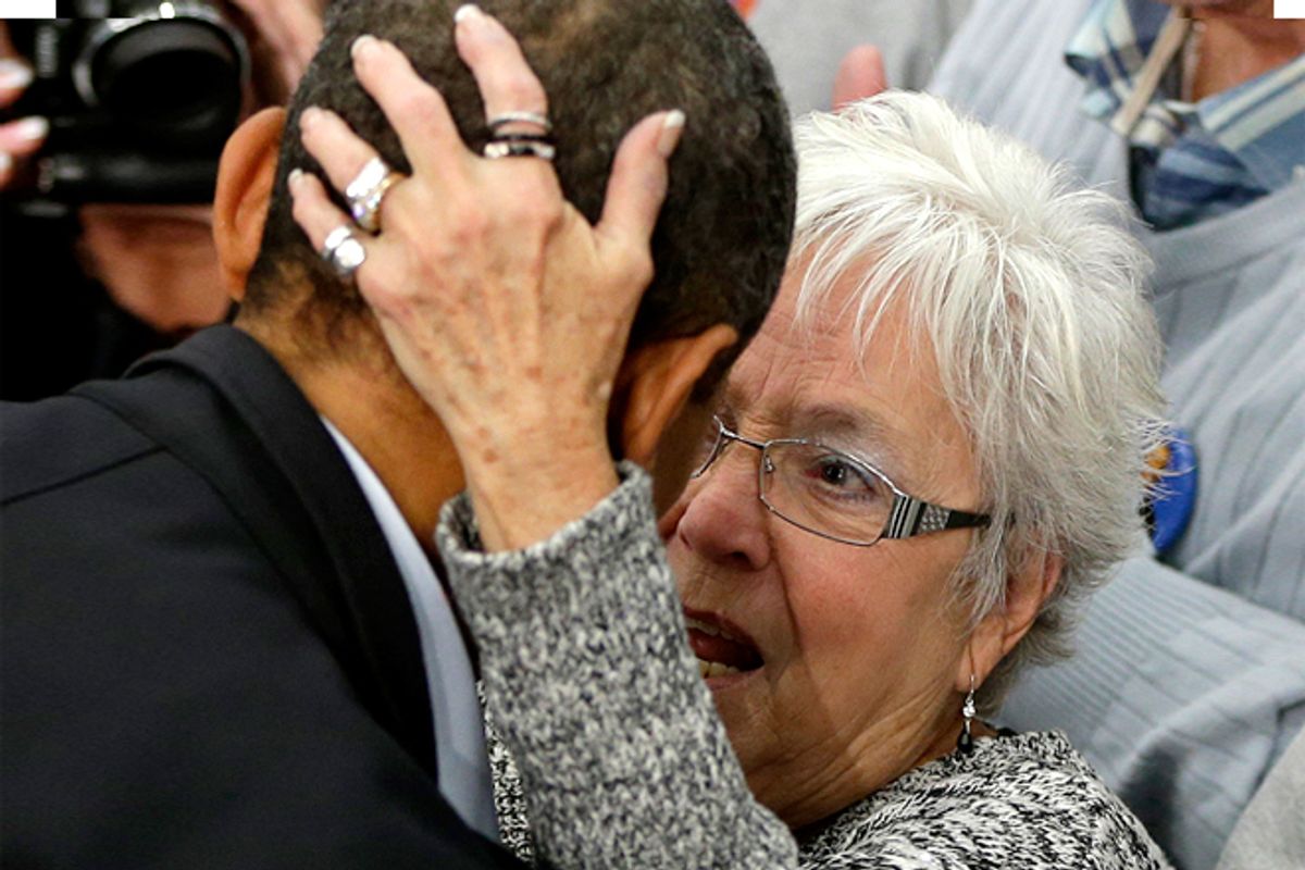 An unidentified supporter grabs the back of President Barack Obama's head during the president's campaign event at Springfield High School, Friday, Nov. 2, 2012, in Springfield, Ohio. (AP Photo/Pablo Martinez Monsivais)         (Pablo Martinez Monsivais)