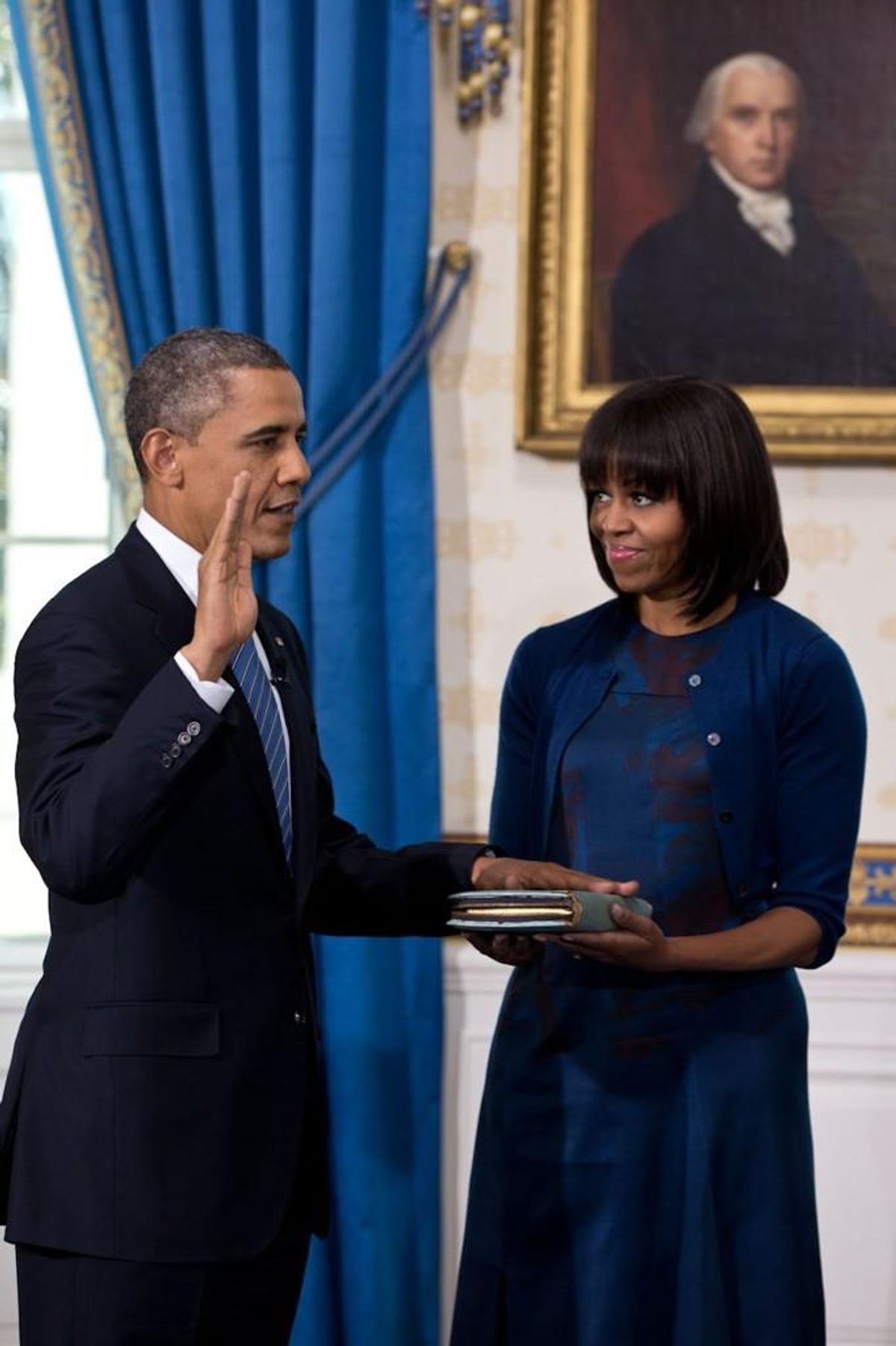 With Michelle Obama holding the bible, President Obama takes the oath of office Jan. 20, 2013   (Pete Souza/White House)