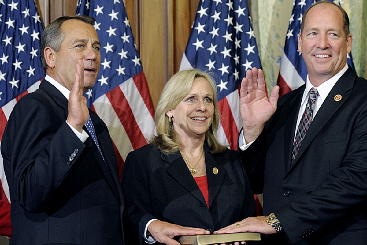 John Boehner performs a mock swearing in for Rep. Ted Yoho, R-Fla., Thursday, Jan. 3, 2013, on Capitol Hill.          (AP/Cliff Owen)