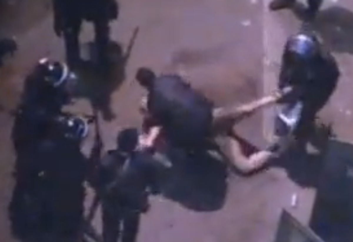  Screenshot from ONTV appears to show Morsi's police beating Hamada Saber, 50 (Twitter)  