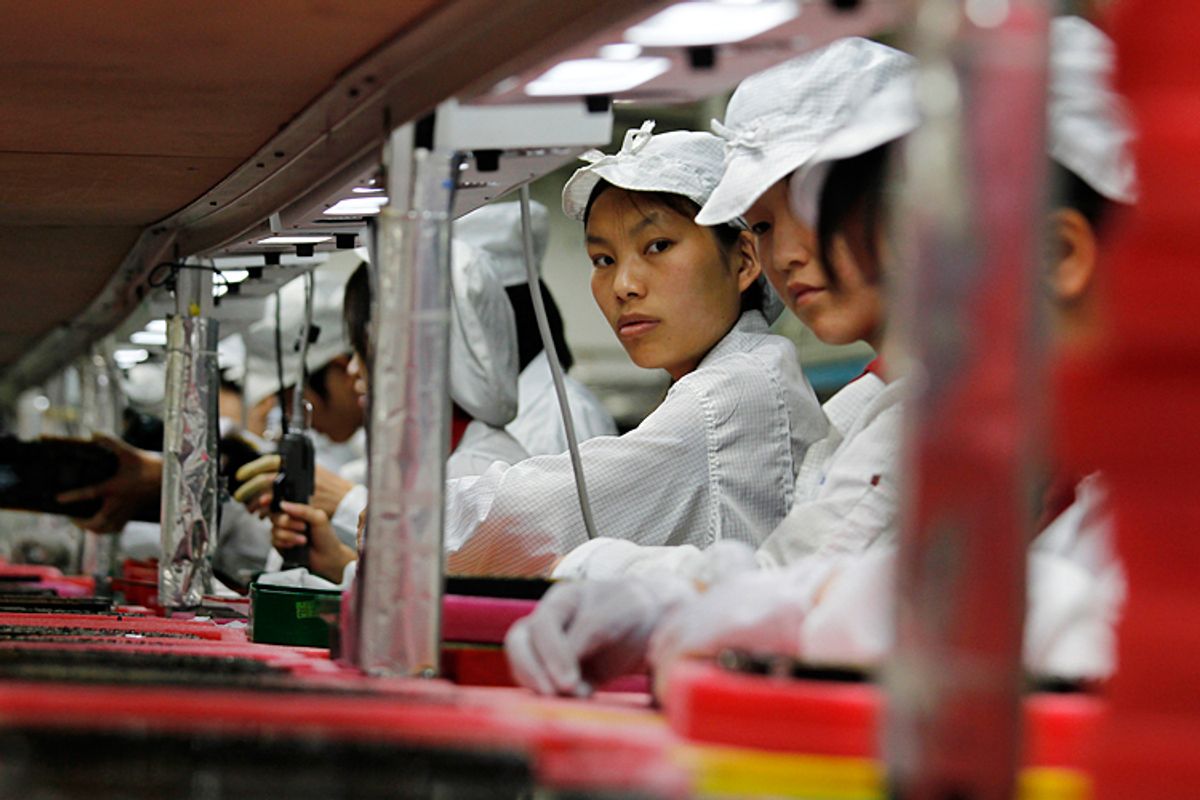 Workers are seen inside a Foxconn factory in the township of Longhua in the southern Guangdong province.   (Reuters/Bobby Yip)