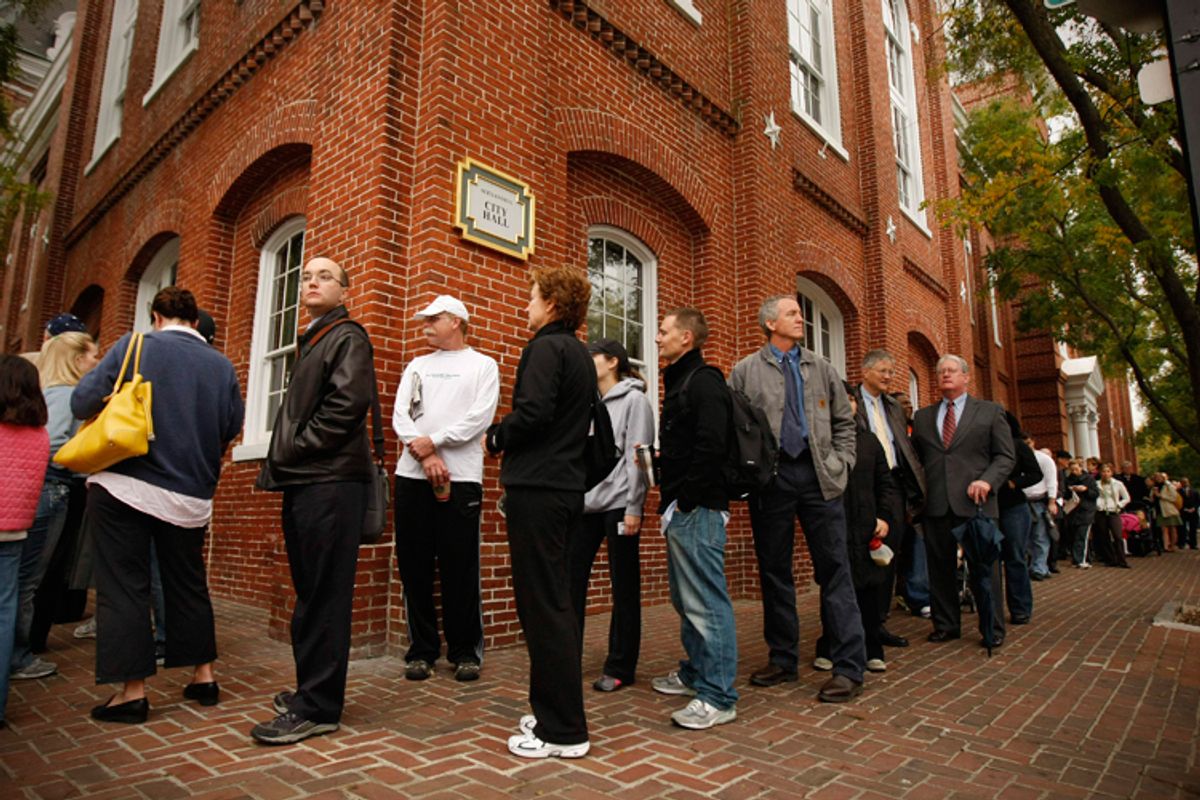 People line up to vote in the early morning at City Hall in Alexandria, Va., Tuesday, Nov. 4, 2008. (AP Photo/Gerald Herbert)    (Gerald Herbert)