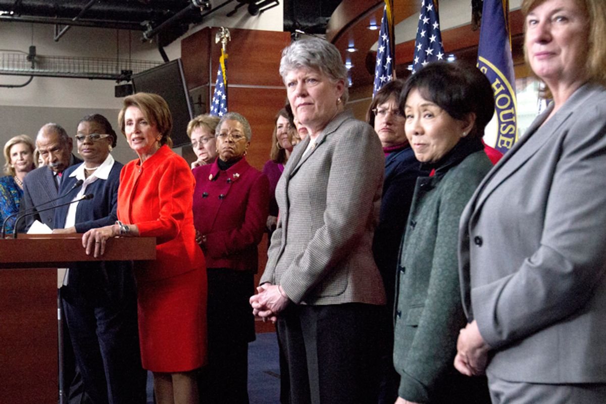 House Minority Leader Nancy Pelosi of Calif., center, accompanied by fellow House Democrats, leads a news conference on Capitol Hill in Washington, Wednesday, Jan. 23, 2013, to discuss the  reintroduction of the Violence Against Women Act.     (AP/Jacquelyn Martin)