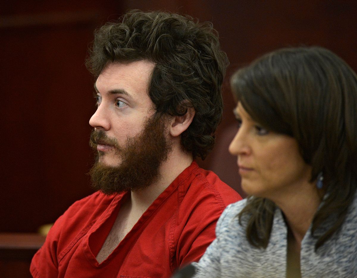 James Holmes, left, and defense attorney Tamara Brady appear in district court in Centennial, Colo. for his arraignment.       (AP/The Denver Post, RJ Sangosti)