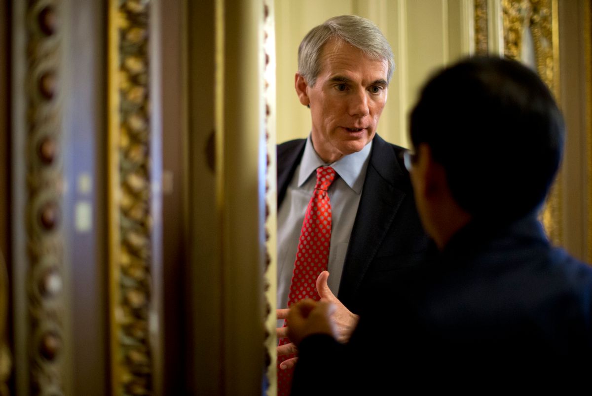 Sen. Rob Portman, R-Ohio. pauses to talk on Capitol Hill in Washington, Tuesday, Feb. 26, 2013, after the weekly Republican policy luncheon.             (AP/Carolyn Kaster)