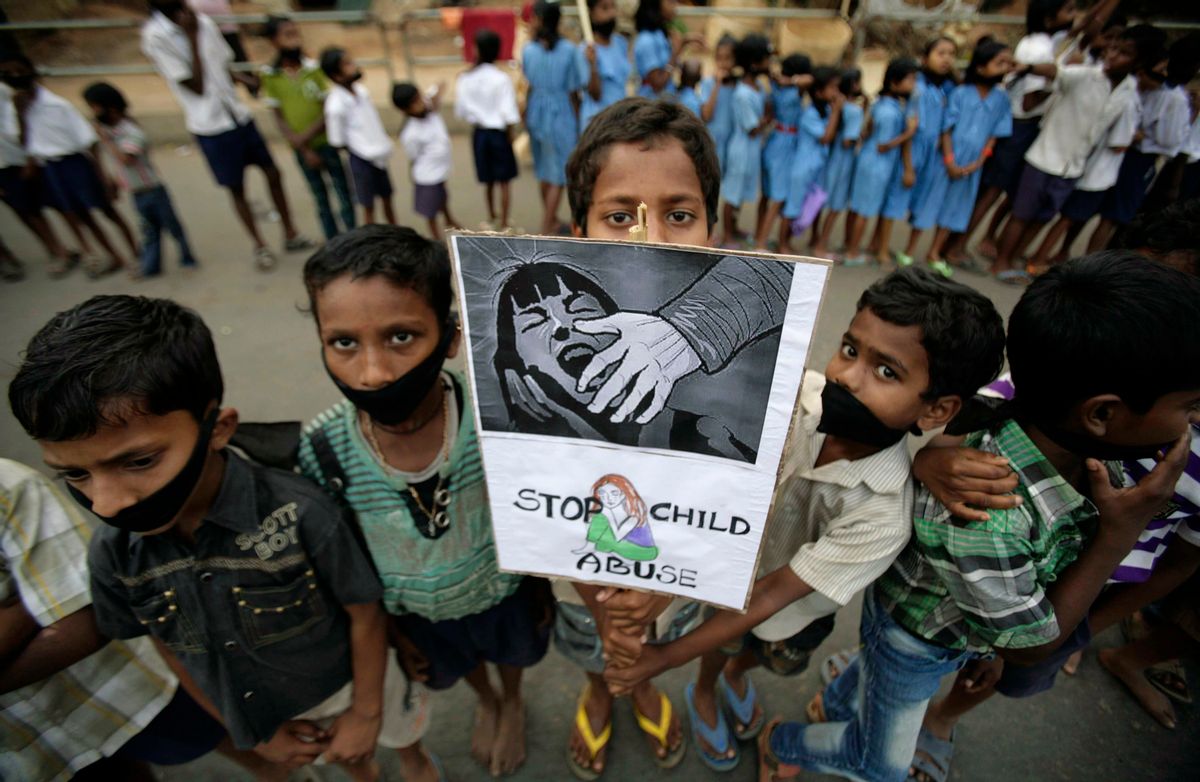 Indian children participate in a protest against child abuse and rising crimes against women, in Bhubaneswar, India, Saturday, March 16, 2013.     (AP/Biswaranjan Rout)
