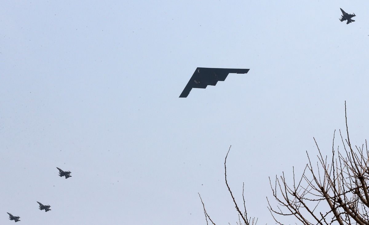 The United States air force's B-2 stealth bomber flies over near the Osan U.S. Air Base in Pyeongtaek, south of Seoul, South Korea.    (AP/Shin Young-keun, Yonhap)
