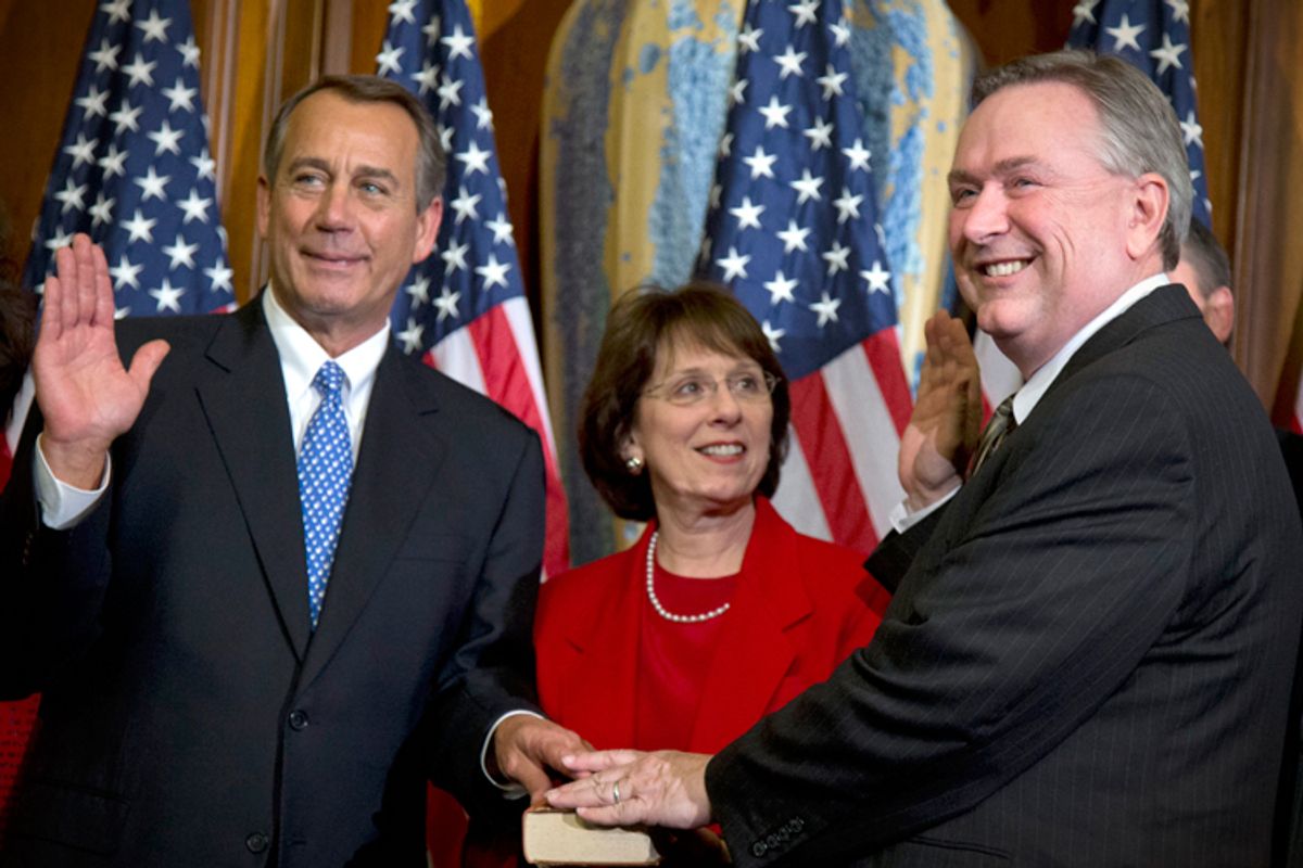 Rep. Steve Stockman, R-Texas, right, participates in a mock swearing-in ceremony with John Boehner, R-Ohio, Jan. 3, 2013.                                  (AP/Evan Vucci)