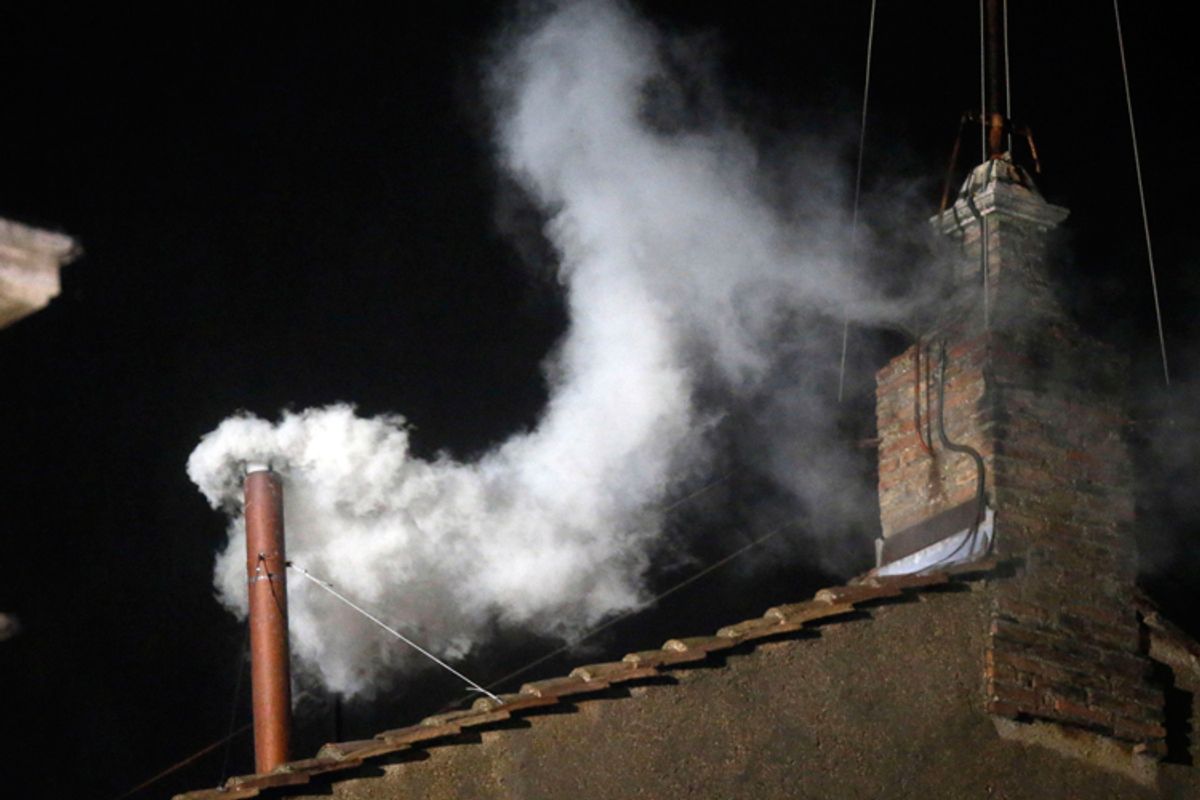 White smoke emerges from the chimney on the roof of the Sistine Chapel, in St. Peter's Square at the Vatican, Wednesday, March 13, 2013. The white smoke indicates that the new pope has been elected.     (AP/Gregorio Borgia)