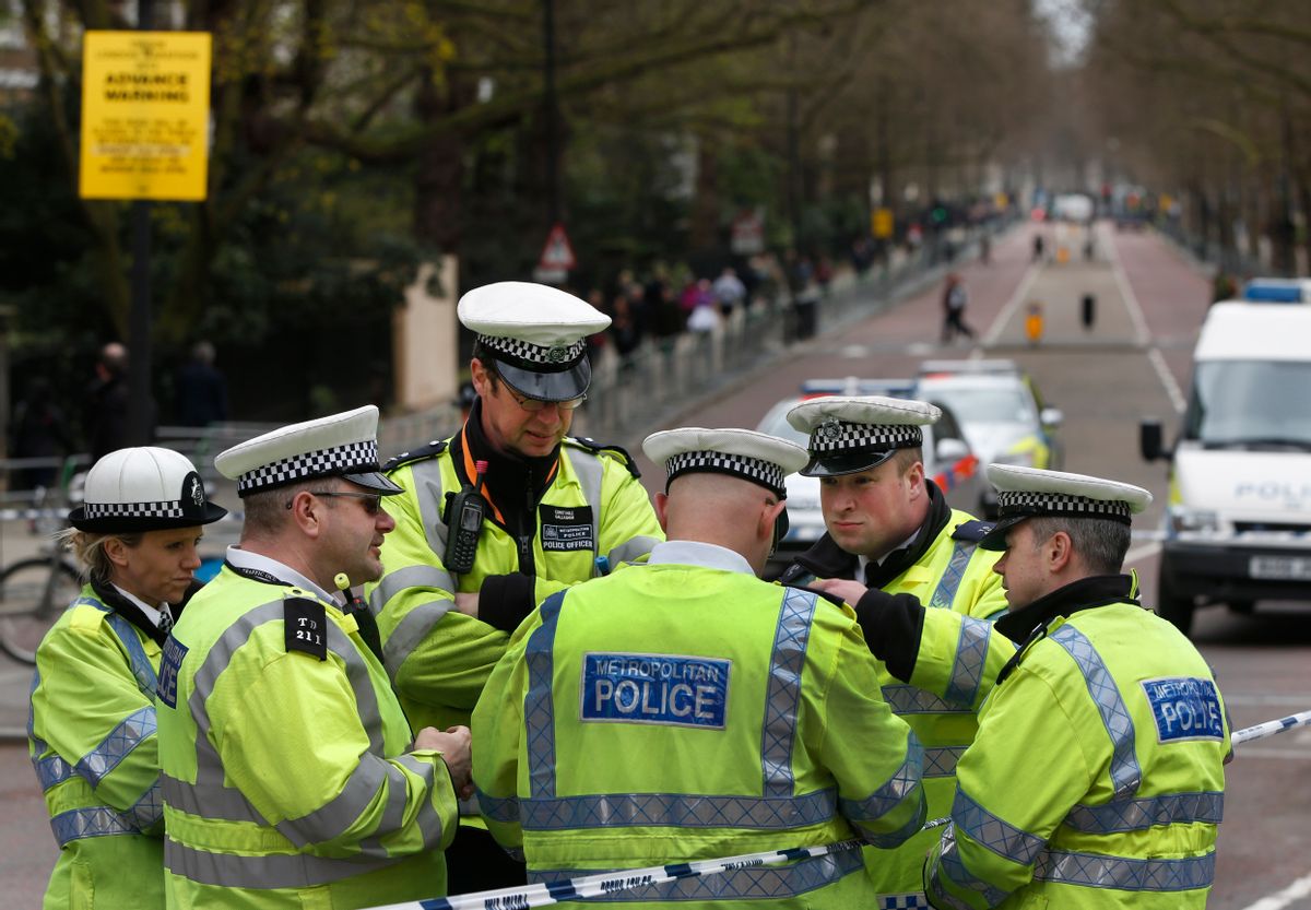 British police officers gather near the Mall in central London, Friday, April 19, 2013, where the London Marathon finish line will be on Sunday, April, 21, 2013.       (AP/Lefteris Pitarakis)