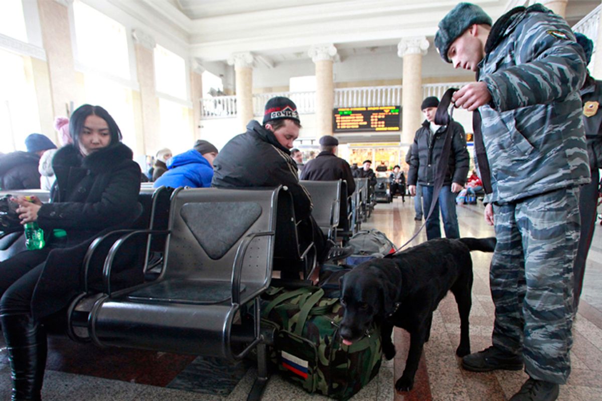 Police check luggages for explosives at railway station in Krasnoyarsk, March 31, 2010. Authorities said the blasts were linked to the North Caucasus - a string of heavily Muslim provinces that includes Chechnya     (Reuters/Ilya Naymushin)