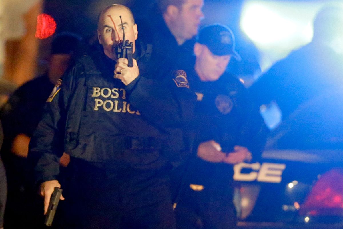 Police officers work a crime scene Friday, April 19, 2013, in Watertown, Mass.   (AP/Matt Rourke)