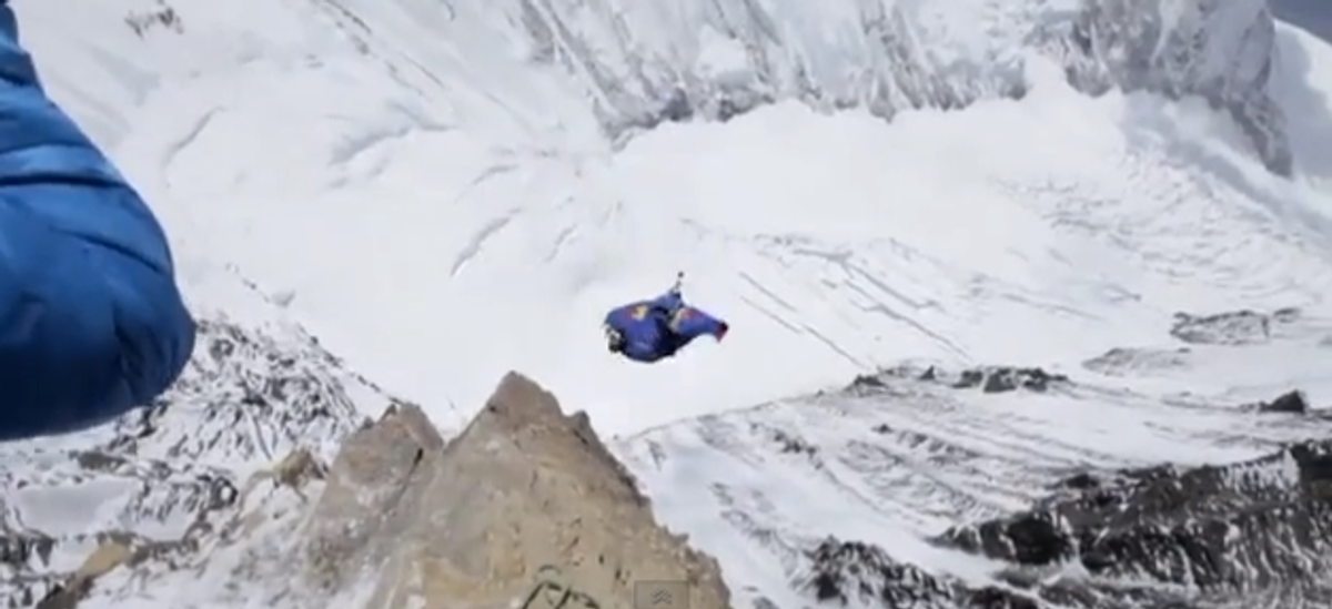 Must-see morning clip: Russian daredevil sets new base jump world ...