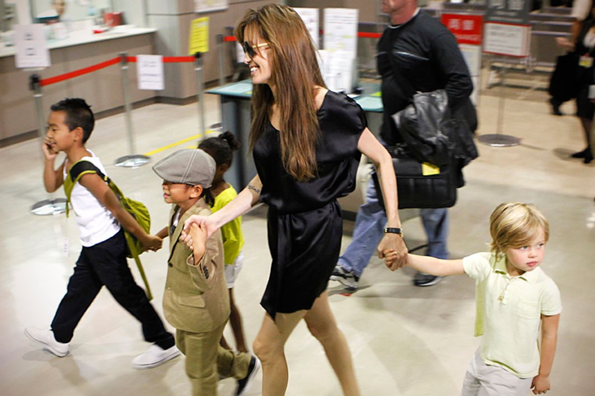 Angelina Jolie with her children, July 26, 2010.        (Reuters/Toru Hanai)
