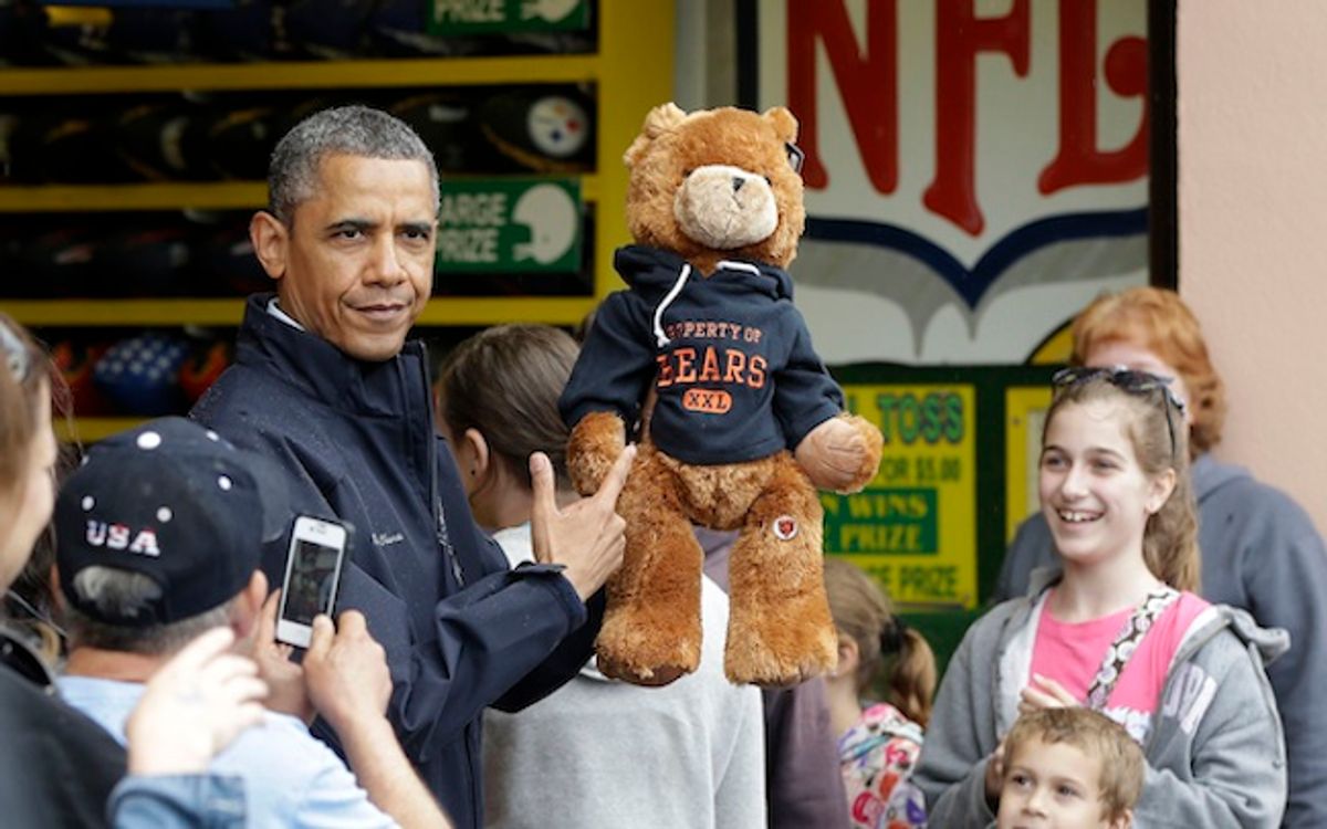 New Jersey Gov. Chris Christie wins President Obama a Chicago (teddy) bear on the Jersey Shore, Tuesday. At least it wasn't wearing a fleece.         (AP/Pablo Martinez Monsivais)