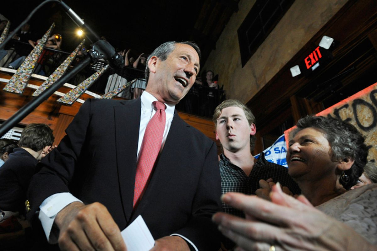 Former South Carolina Gov. Mark Sanford, left, gives his victory speech after winning back his old congressional seat in the state's 1st District on Tuesday, May 7, 2013, in Mt. Pleasant, S.C. (AP Photo/Rainier Ehrhardt)  (Rainier Ehrhardt)