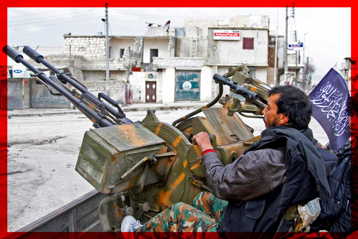 Free Syrian Army fighters sit behind their anti-aircraft weapon in Aleppo, Syria, Friday February 8, 2013.     (AP/Abdullah Al-yassin)