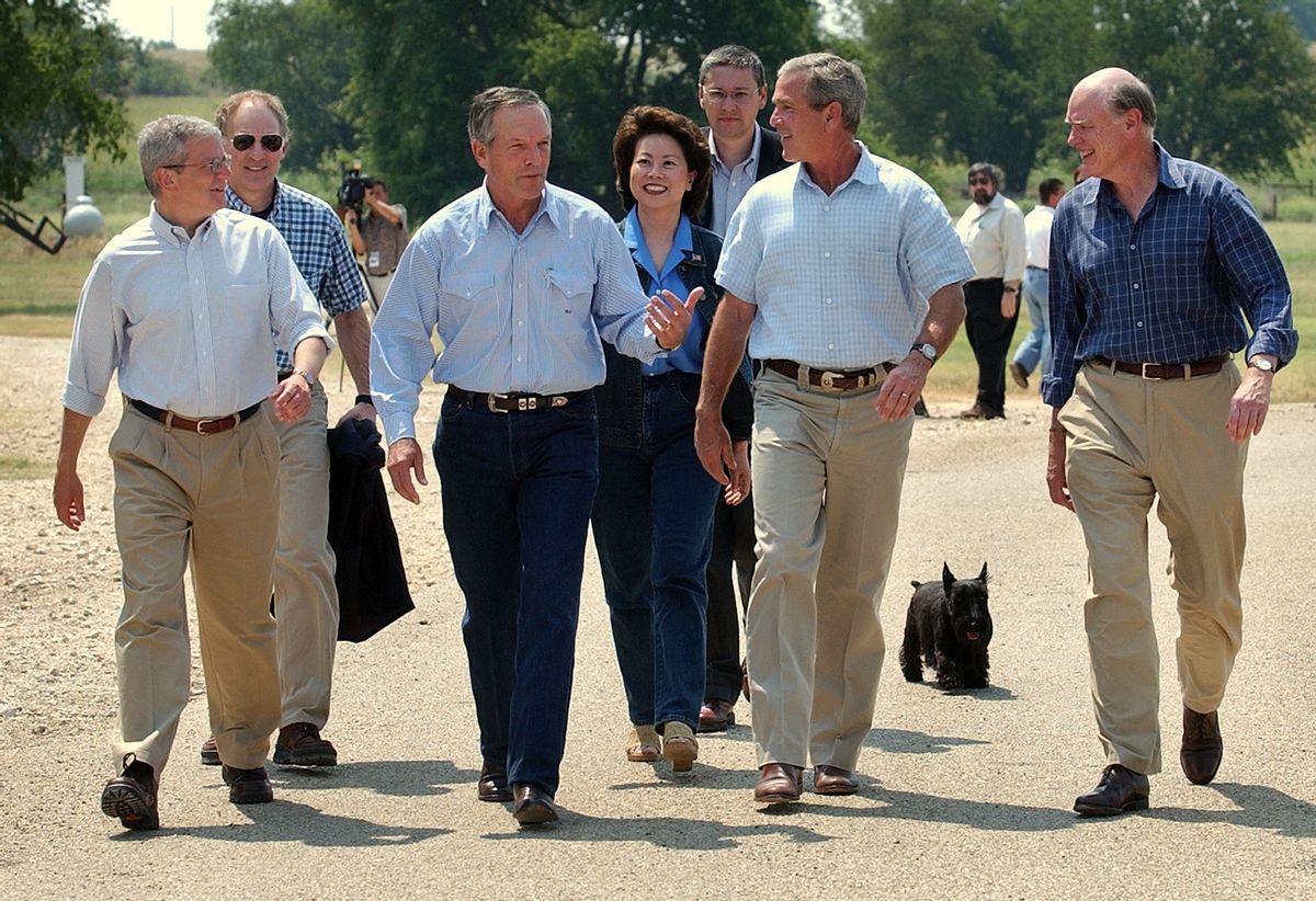 President Bush walks with George Mankiw, center, and his his team of economic advisors in 2003.      (AP/Gerald Herbert)