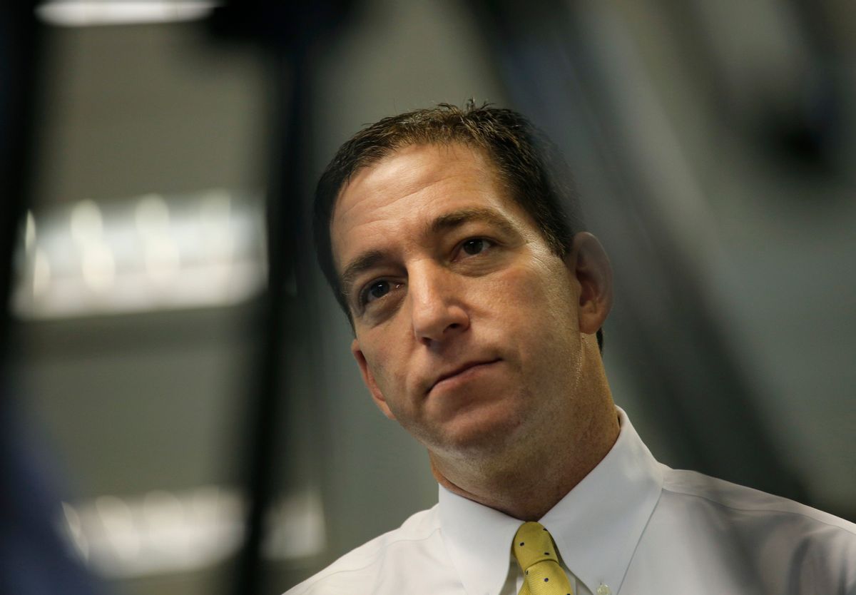Glenn Greenwald, a reporter of The Guardian newspaper, speaks to The Associated Press after a after a live interview in Hong Kong Tuesday, June 11, 2013.              (AP/Vincent Yu)