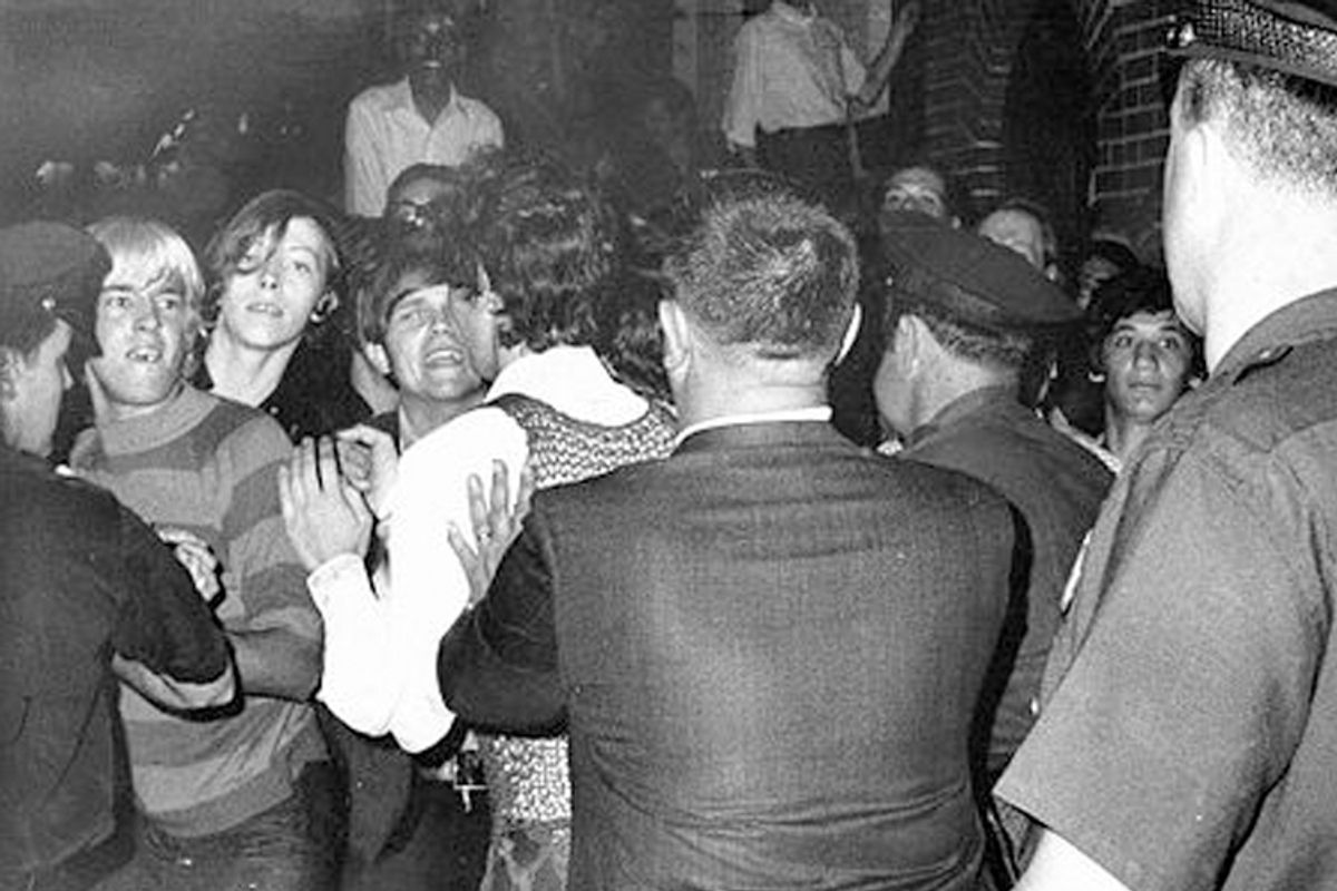 Police force people back outside the Stonewall Inn as tensions escalate the morning of June 28, 1969.     (Wikimedia/Joseph Ambrosini)