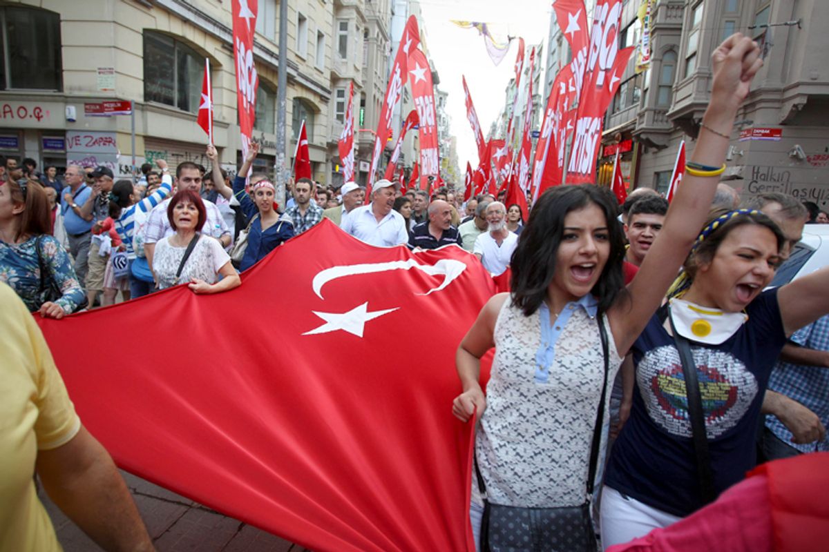 Protesters at an anti-government protest at the Taksim square in Istanbul, Sunday, June 2, 2013.    (AP/Thanassis Stavrakis)
