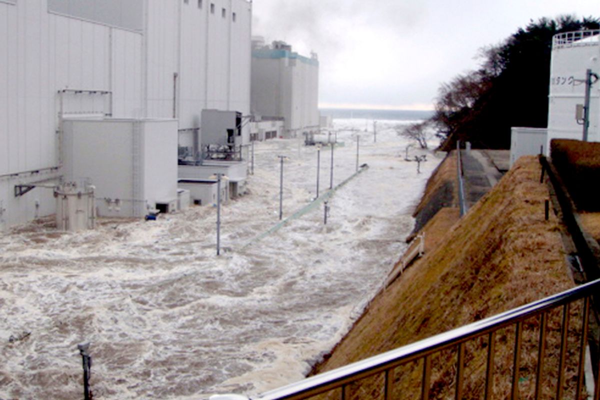 Fukushima Dai-ichi nuclear power plant is flooded as a tsunami strikes       (AP/Anonymous)