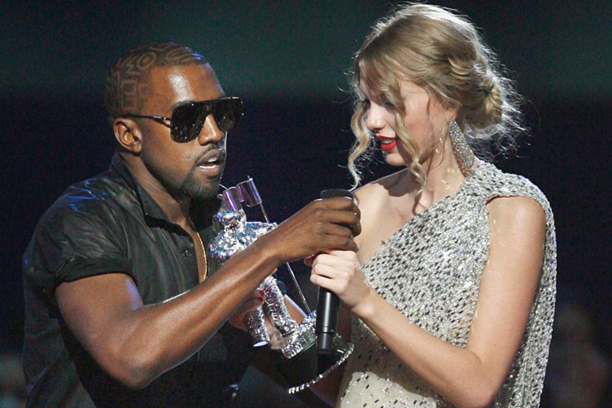 Singer Kanye West takes the microphone from singer Taylor Swift during the 2009 MTV Video Music Awards.            (AP/Jason Decrow)