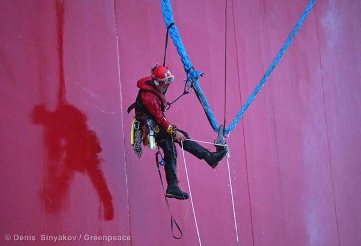 Five Greenpeace International activists attempt to climb 
the Prirazlomnaya, an oil platform operated by Russian state-owned energy giant Gazprom platform in Russias Pechora Sea.  (Greenpeace/Denis  Sinyakov)