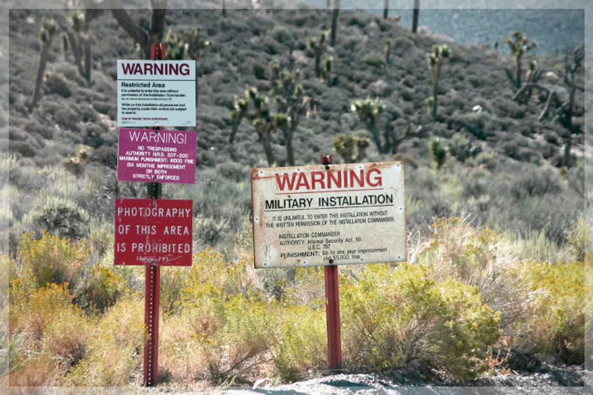 The warning signs on the road leading into Groom Lake, aka Area 51.    (<a href='http://www.istockphoto.com/user_view.php?id=3691503'>sipaphoto</a> via <a href='http://www.istockphoto.com/'>iStock</a>)
